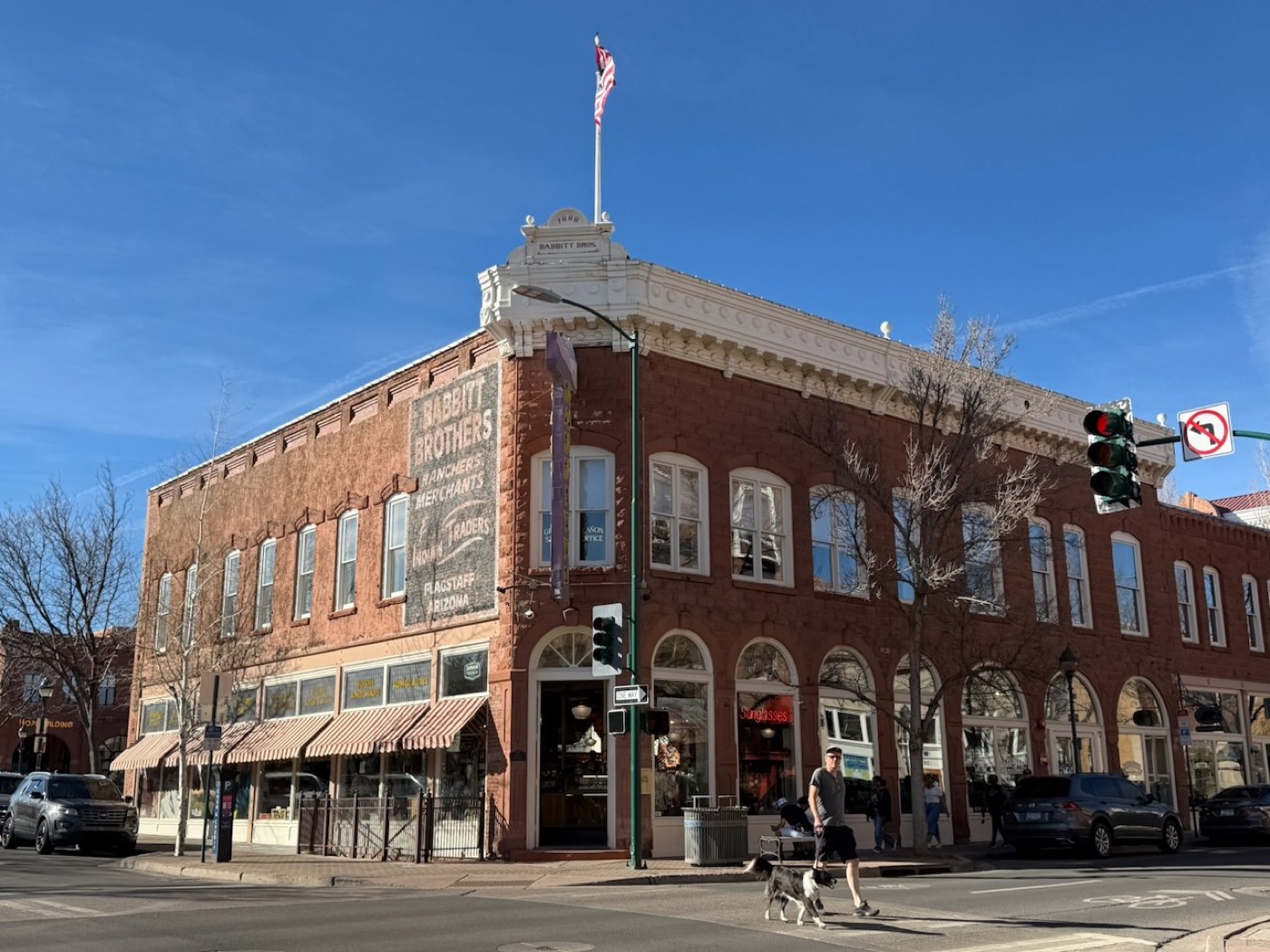 The painted Babbitt Brothers ghost sign on a downtown Flagstaff brick wall